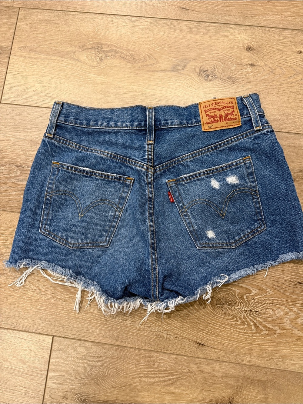 Levi's Distressed Dark Blue Denim Cutoff Shorts